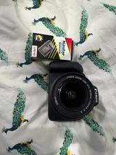 Canon EOS 2000D / Rebel T7 24.1MP CMOS 1080p DSLR Camera  EF-S 18-55mm Lens