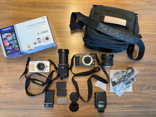 Olympus PEN Mini E-PM2 with Additional Olympus Camera