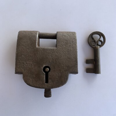 Iron padlock or lock with key, barbed spring, old or antique, strong ...