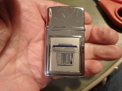 2N-unfired  NIMROD cigar lighter w/ adding machine motifs-pat. 2432265