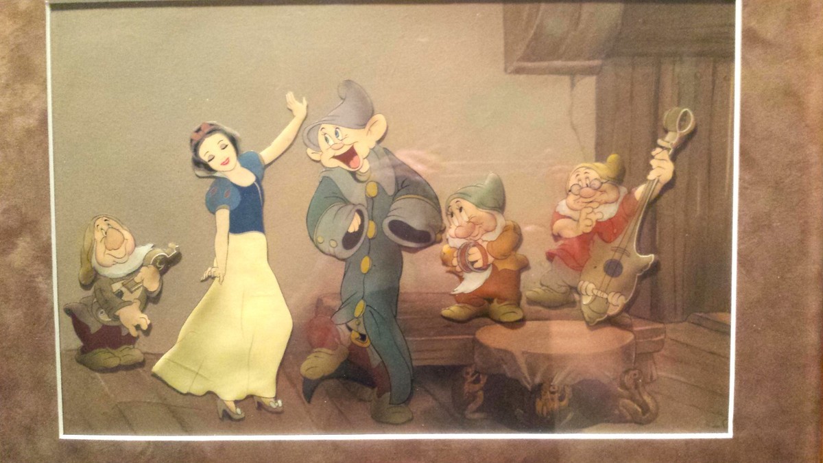 SNOW WHITE SILLY DANCE, KEY MATCHING TRIMMED CELS ON PRODUCTION BG