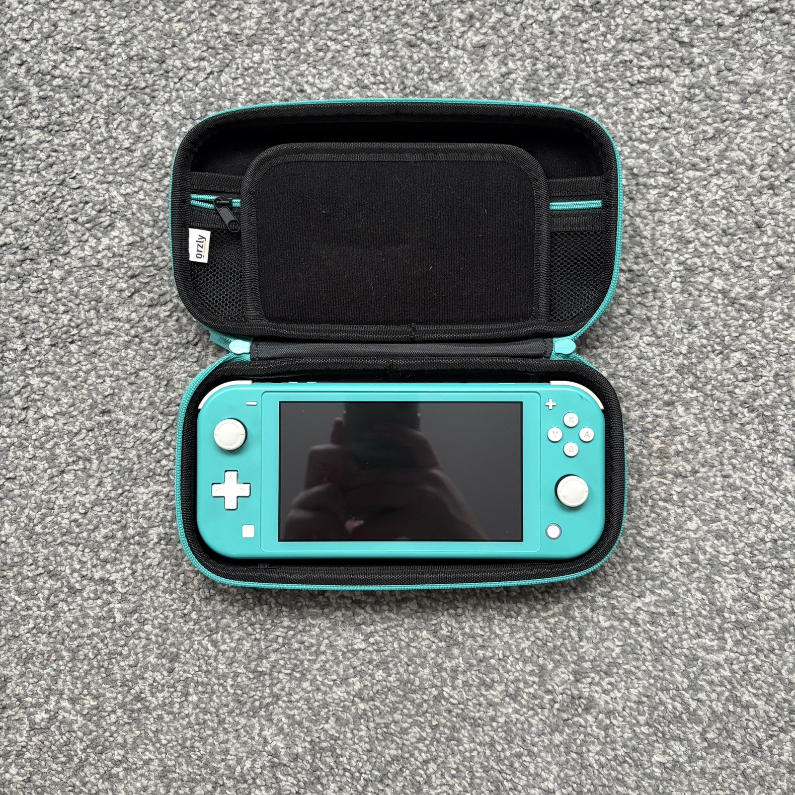 Nintendo Switch Lite Turquoise Blue Handheld Gaming System With Case 32GB
