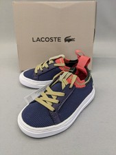 Zapatilla deportiva Lacoste unisex-niño infantil La Piquee azul marino/rojo, 5,5