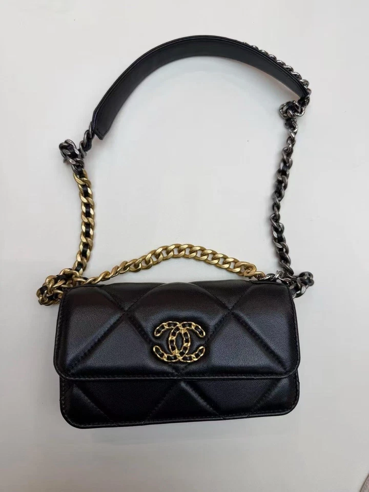 CHANEL sac bandoulière cuir noir matelassé logo anse chaîne dorée doublure rouge - Photo 1/4