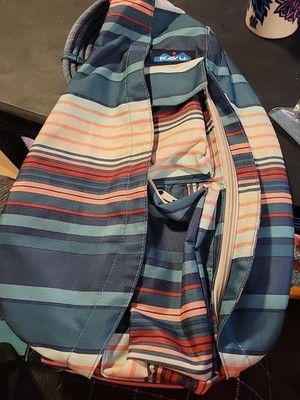 C6-  KAVU Rope Bag Sling Backpack with Blues greens white peach pink lines bag