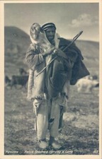 PALESTINIA native shepherd carrying lamb RPPC 1940s