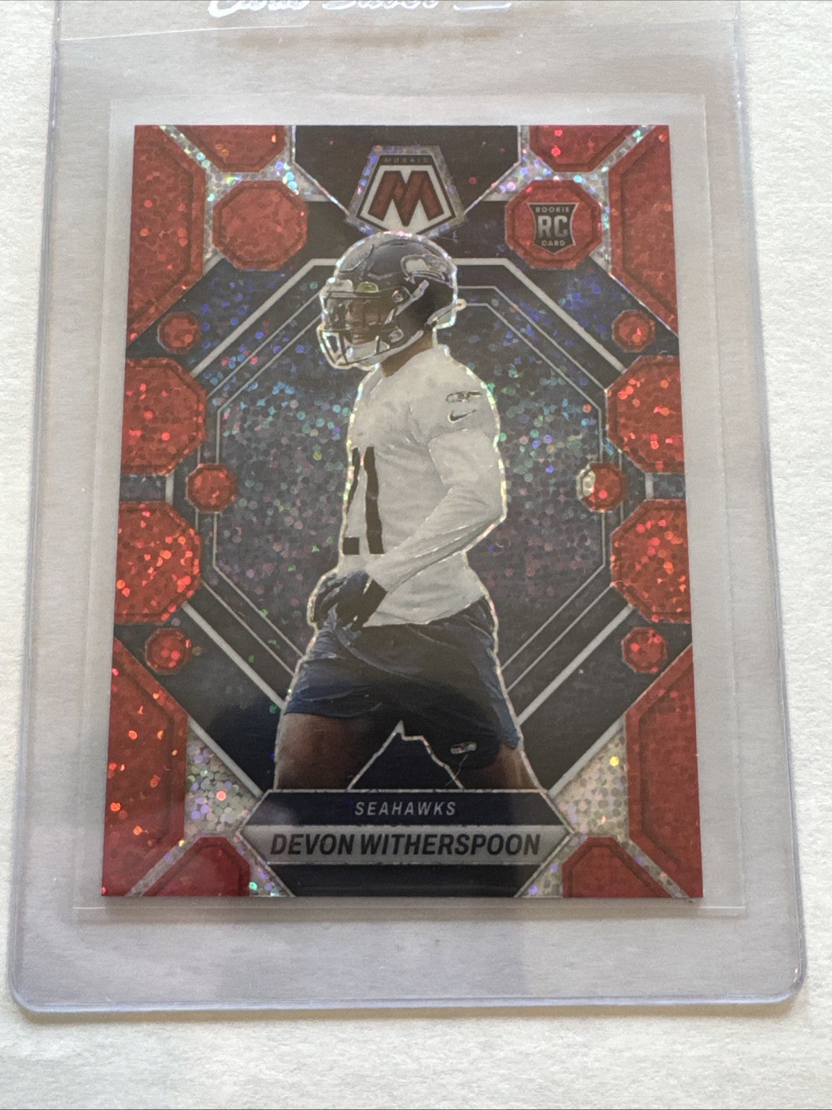 2023 Panini Mosaic - Rookies Devon Witherspoon #313 Red Sparkle Prizm (RC)