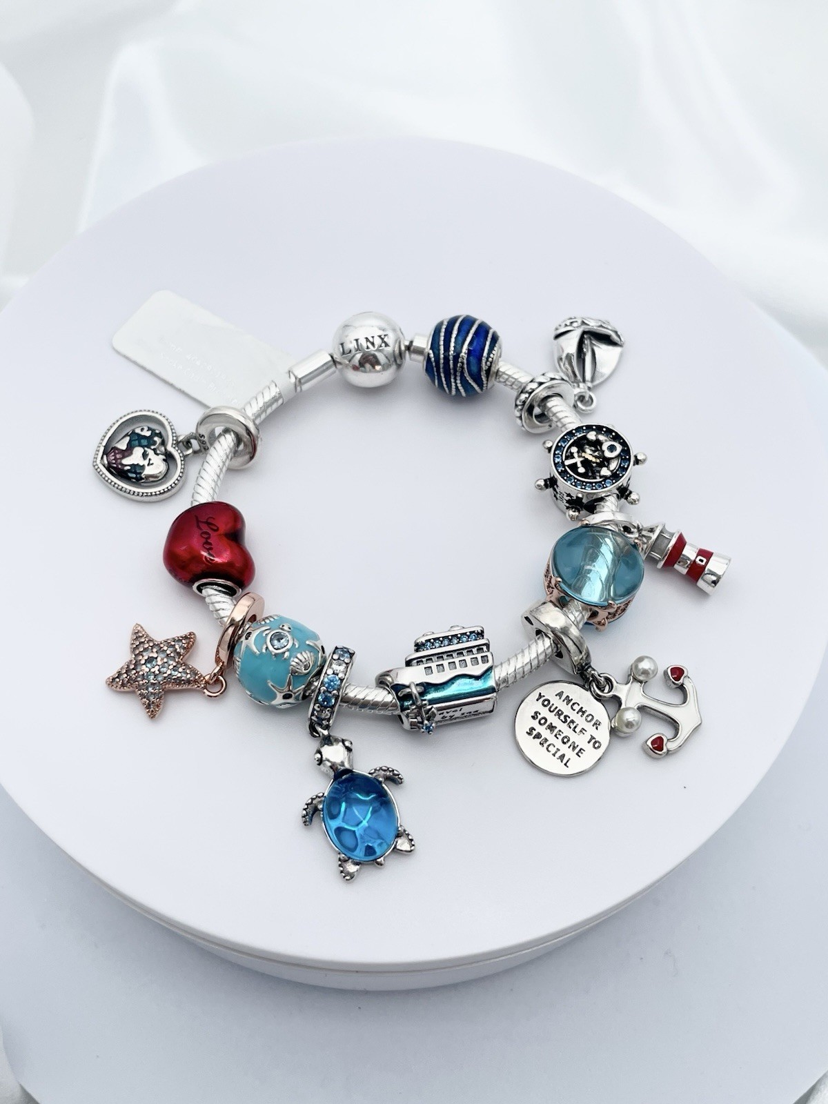 Linx Silver Snake Chain Bracelet with Nautical Themed Charms