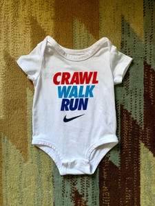 white nike baby onesie