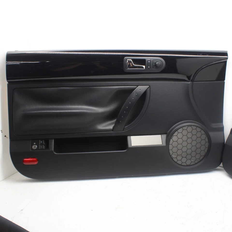 03-10 JUEGO PANELES PUERTA CONDUCTOR PASAJERO VOLKSWAGEN BEETLE CONVERTIBLE NEGRO Foto 2 de 4
