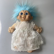 Troll Vintage 1992 Doll Blue Hair, big Blue eyes, wearing a dress tulle Dress