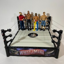 Mattel Official WWE Wrestlemania Spring Loaded Ring 2010 + 4 Figures Used