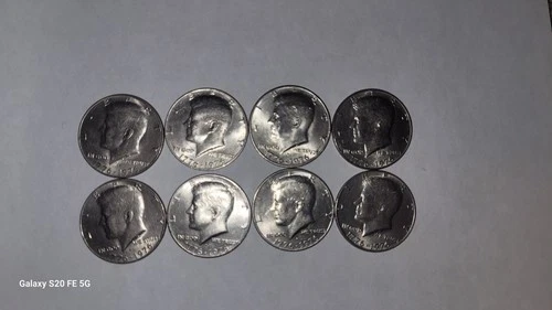 Lot of 8 1776-1976 bicentennial half dollars Xtra fine