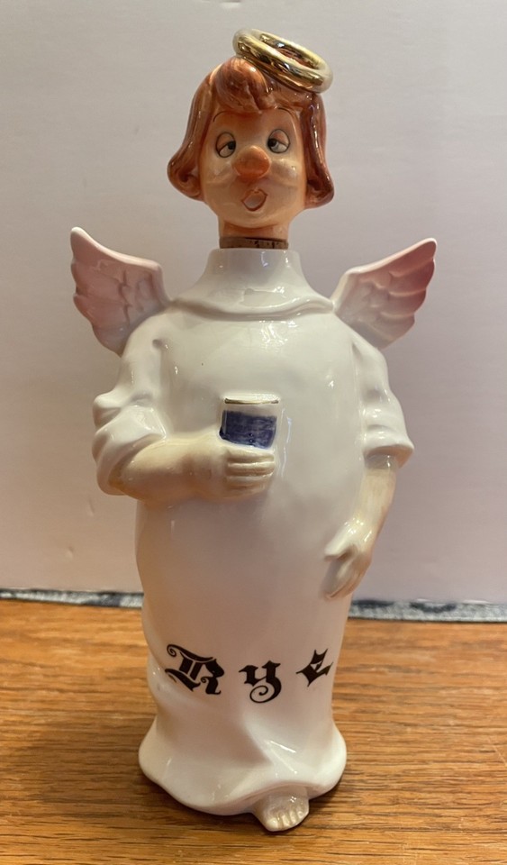 A 1962 ceramic 'Fallen Angel' rye decanter with cork stopper — the kind of mid-century barware that stops a room.