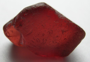 GARNET / MALAYA VARIATION, PINKISH ORANGE ROUGH FOR FACETING, TANZANIA, AFRICA