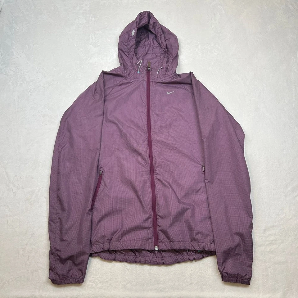 Chaqueta cortavientos Nike para correr para mujer mediana con capucha atlética pista púrpura Foto 2 de 4