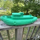 Vintage 20” MARX Tug Boat Green Rolling Ship Whistling Wheels Plastic Pull Toy