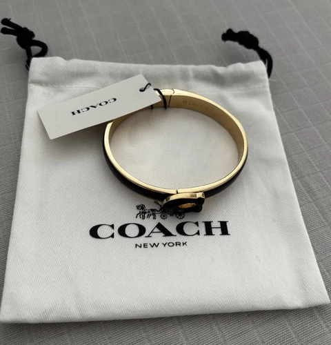 Autentico Bracciale Coach Smalto Tabby Nero e Oro Nuovo con etichette Prezzo consigliato £125