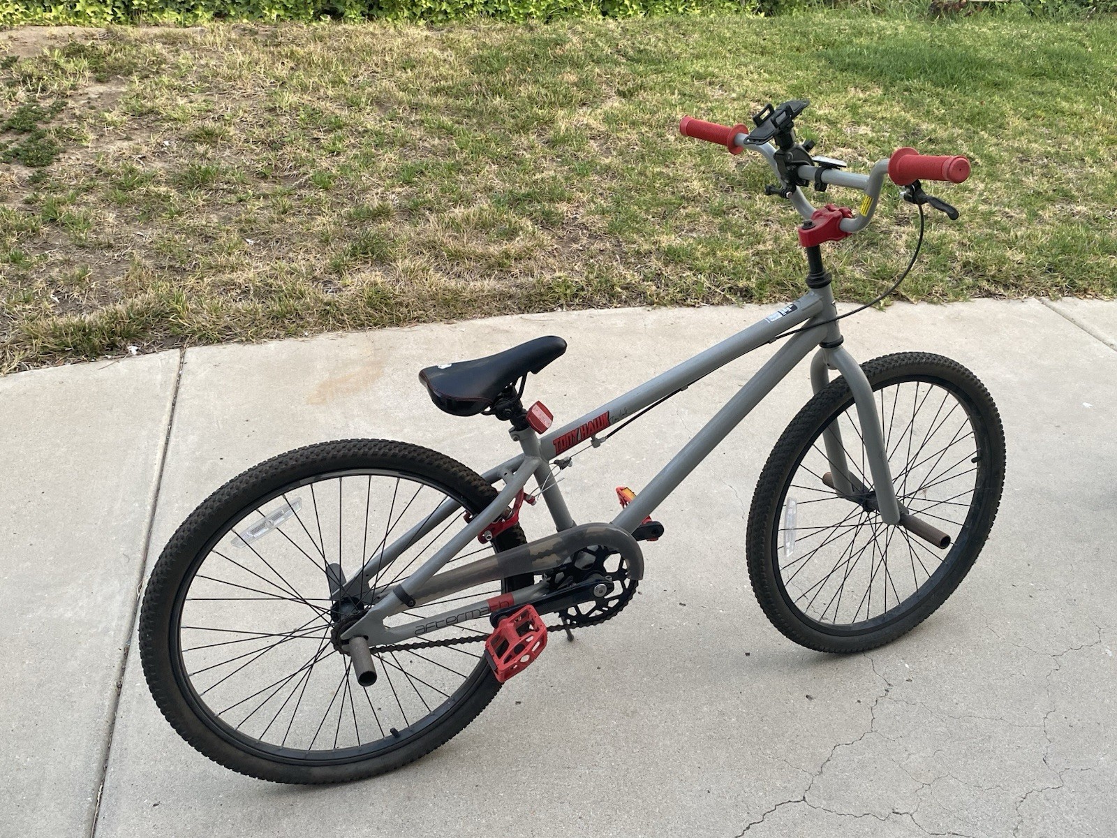 Grey Toney Hawk BMX Bike. Used Good Condition. tired are fla