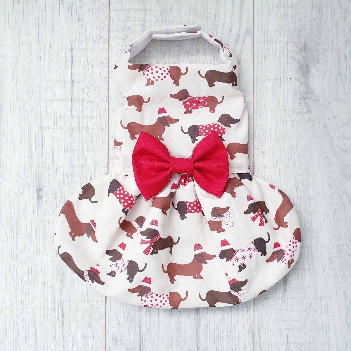 dachshund christmas dress Dachshund Red Christmas Dress On Background Stock Photo 526440766