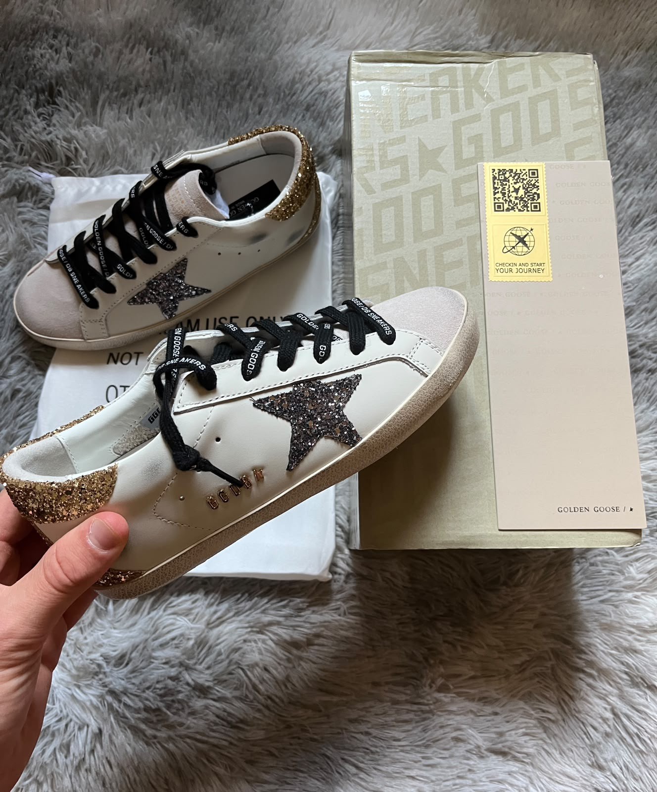 Golden Goose Super-Star in pelle bianca con stella e tallone glitter