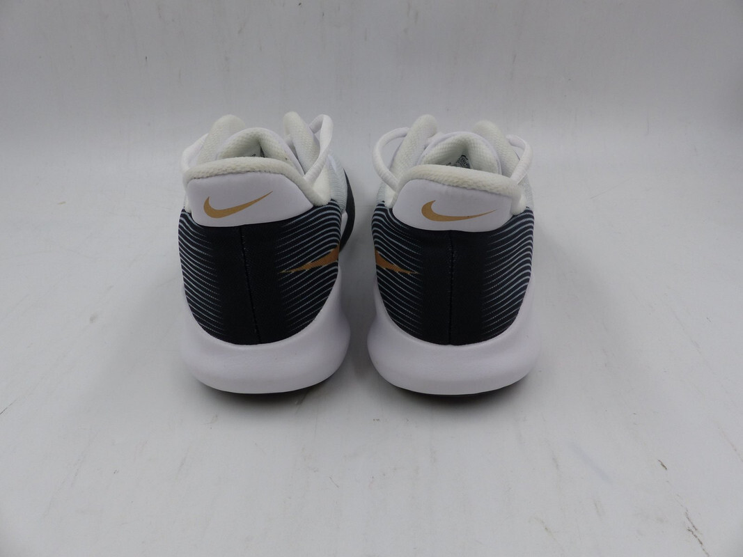 white nike shoes with gold swoosh