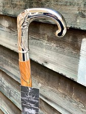 elegant walking stick, twisted cane, wood and metal, black and silver Designer