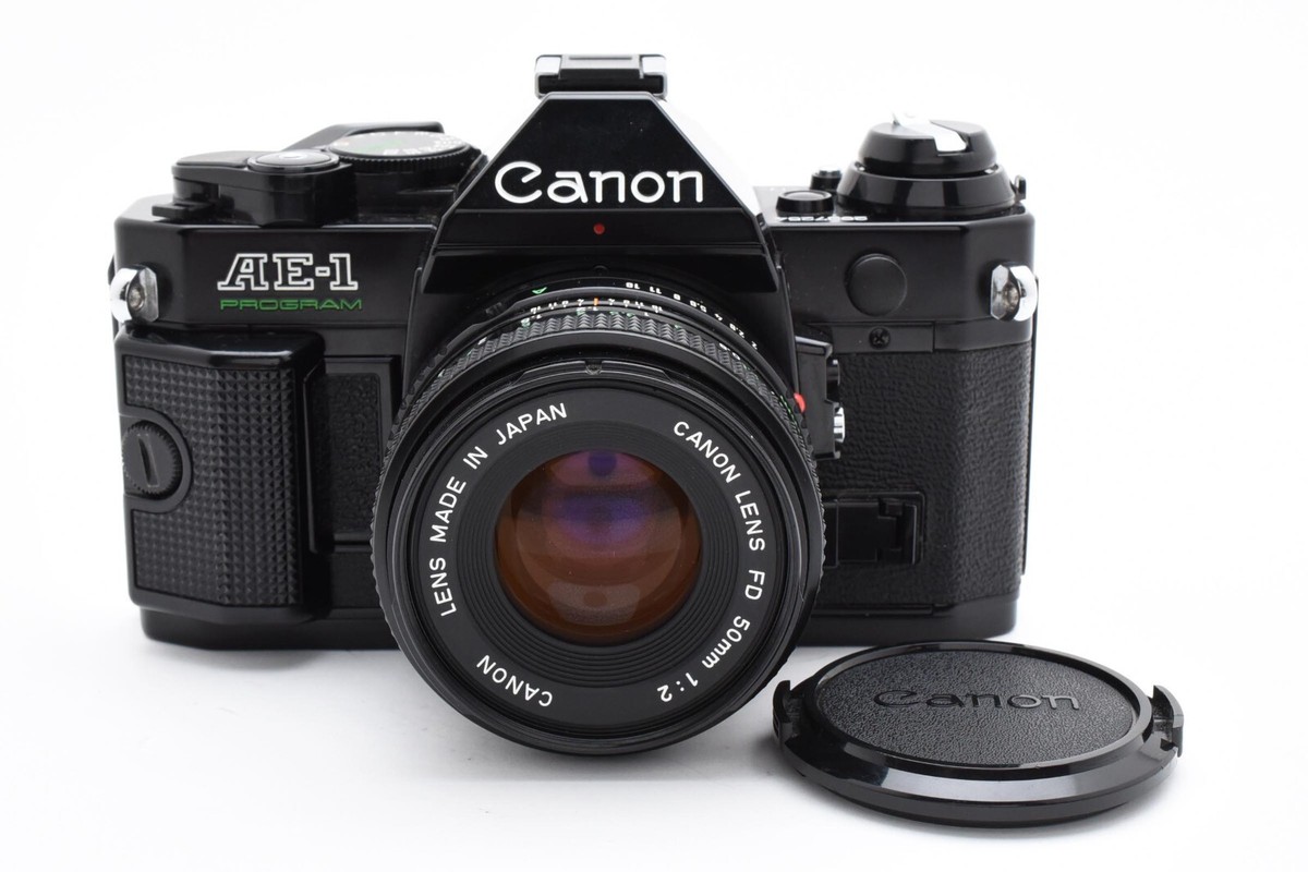 良品 Canon AE-1 + FD 50mm F2 LL3011#Z054 N MINT w/Strap ] Canon AE-1 SLR Film Camera + New FD 50mm F2