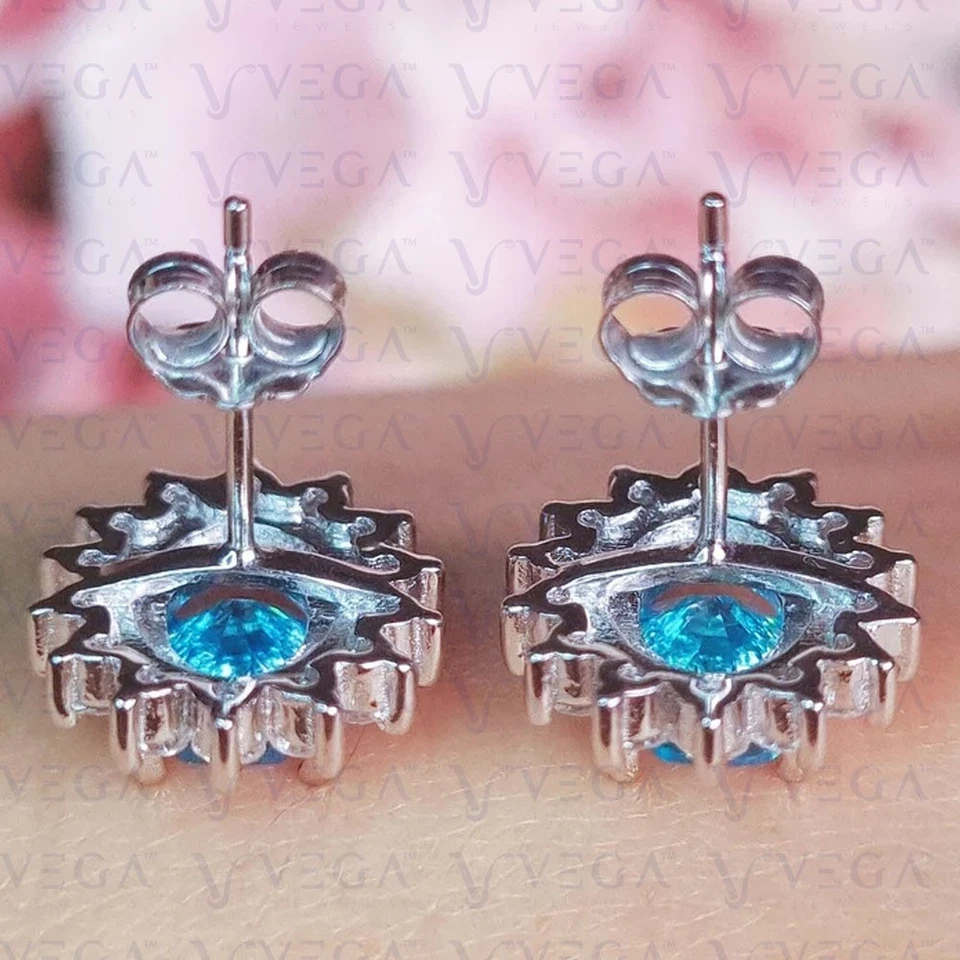 Pendiente de topacio natural ovalado de 4,20 quilates y halo de diamantes enchapado en oro blanco de 18 k Foto 4 de 4