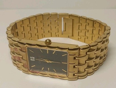 Caravelle By Bulova Gold Tone Black Dial Diamond Womans Watch