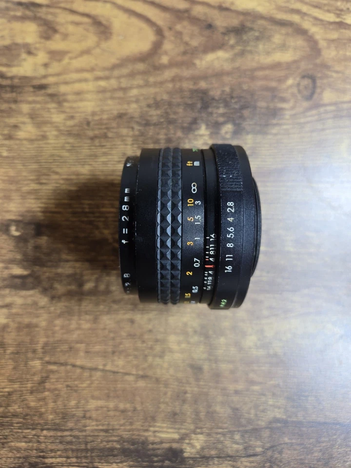 Lente de cámara vintage Focal MC automática 28 mm f/2,8 Japón Montaje Minolta Gran Angular Foto 2 de 3
