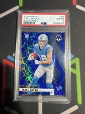 2025 Panini Mosaic Rookie Isaac Teslaa #319 Blue Scope Prizm Detroit Lions PSA 8