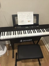 🎹 Donner DEK-200 61 Key Electronic Keyboard With Stool Stand 300 Tones 50 Demo