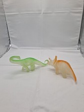 Opaque Orange Triceratops and Green Apatosaurus Dinosaur Toys