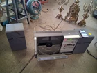 A vintage Sharp VZ-3000 vertical stereo music system from the early 1980s.