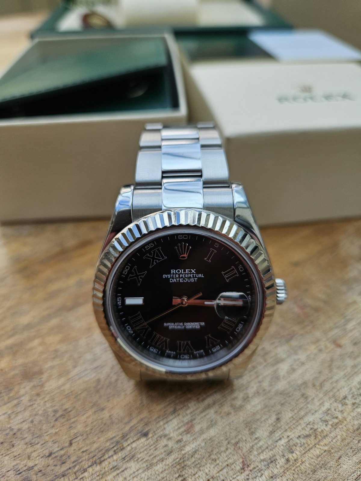 This watch is a Rolex Datejust II model number 116334