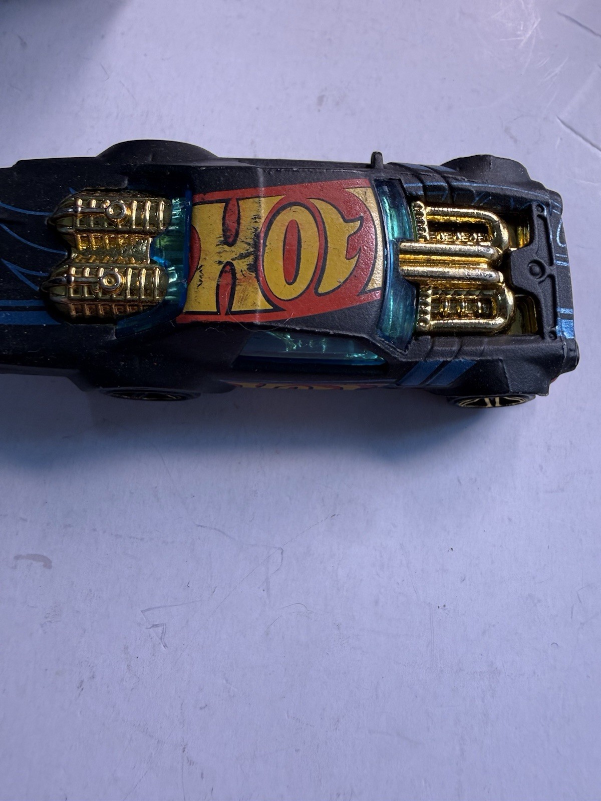 2020 HOT WHEELS NIGHT SHIFTER BLACK 1:64 DIECAST 3" CAR W GOLD YELLOW BLUE & RED