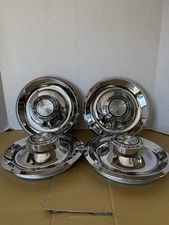(4) ORIGINAL STYLE GM LICENSED DISC BRAKES CENTER CAPS FOR THE RALLY WHEELS