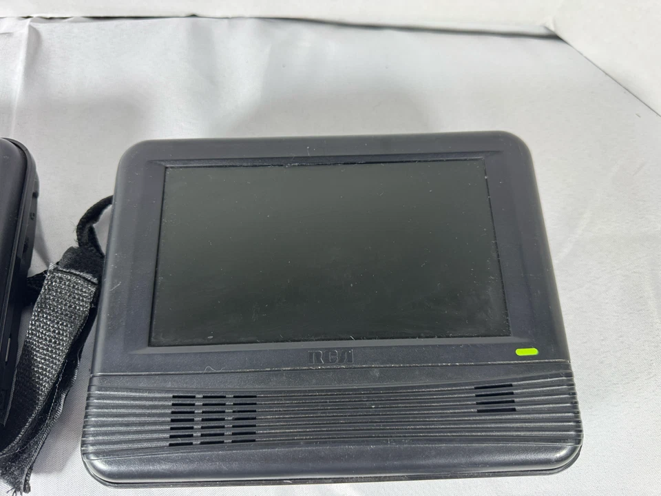 Sistema reproductor de DVD portátil de doble pantalla RCA con control remoto, controlador, cables - probado Foto 3 de 4