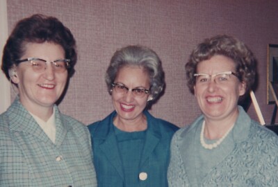 Warm Atmosphere Three Women Smiling Stylish Outfits Glasses