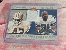 2003 Fleer Tradition Roy Williams Ronnie Lott game worn jersey patch relic 49ERS