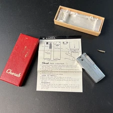 Vtg Zaima Cherub Silver Japan Cigarette Gas Lighter Box & Paper 2.5" Untested