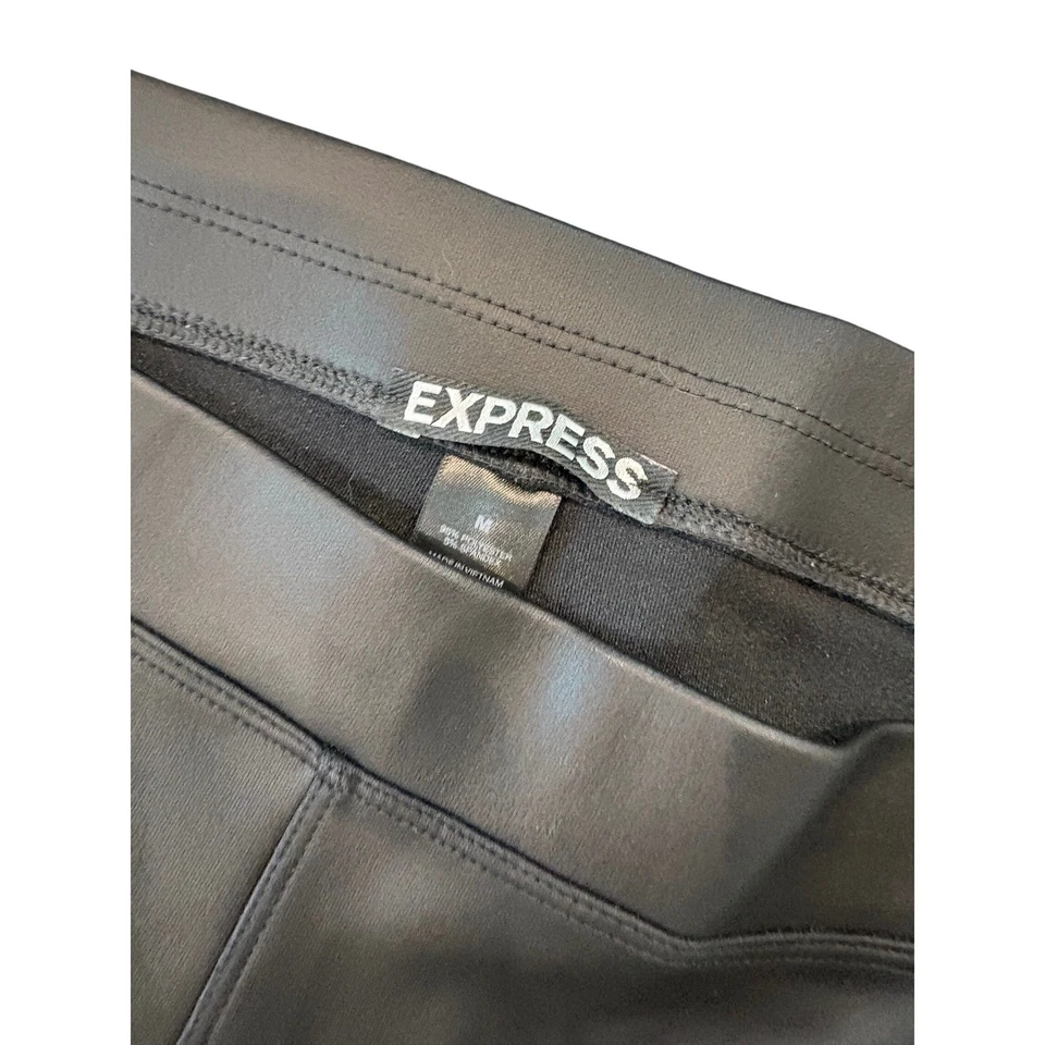 Leggings Express de cuero sintético negros para mujer pantalones de cintura media alta Foto 3 de 4