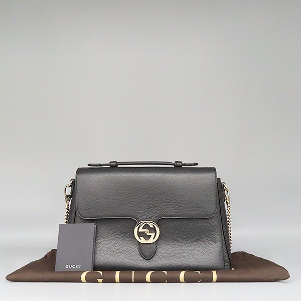 Gucci black leather top handle bag with silver GG logo and chain shoulder strap