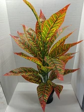 POTTED Artificial Croton plant.