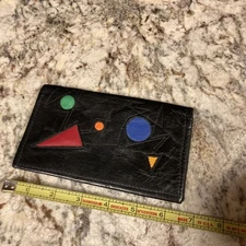 MCM / Abstract ALEXANDER CALDER-inspired black leather checkbook cover