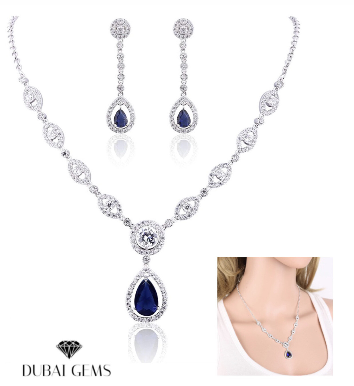 White gold finish pear cut blue sapphire and created diamond necklace  earrings