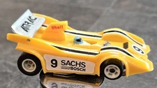 VINTAGE AMRAC KM-1 HO SLOT RACE CAR W CHASSIS MANTA SACHS BOSCH 9 RUNS YELLOW