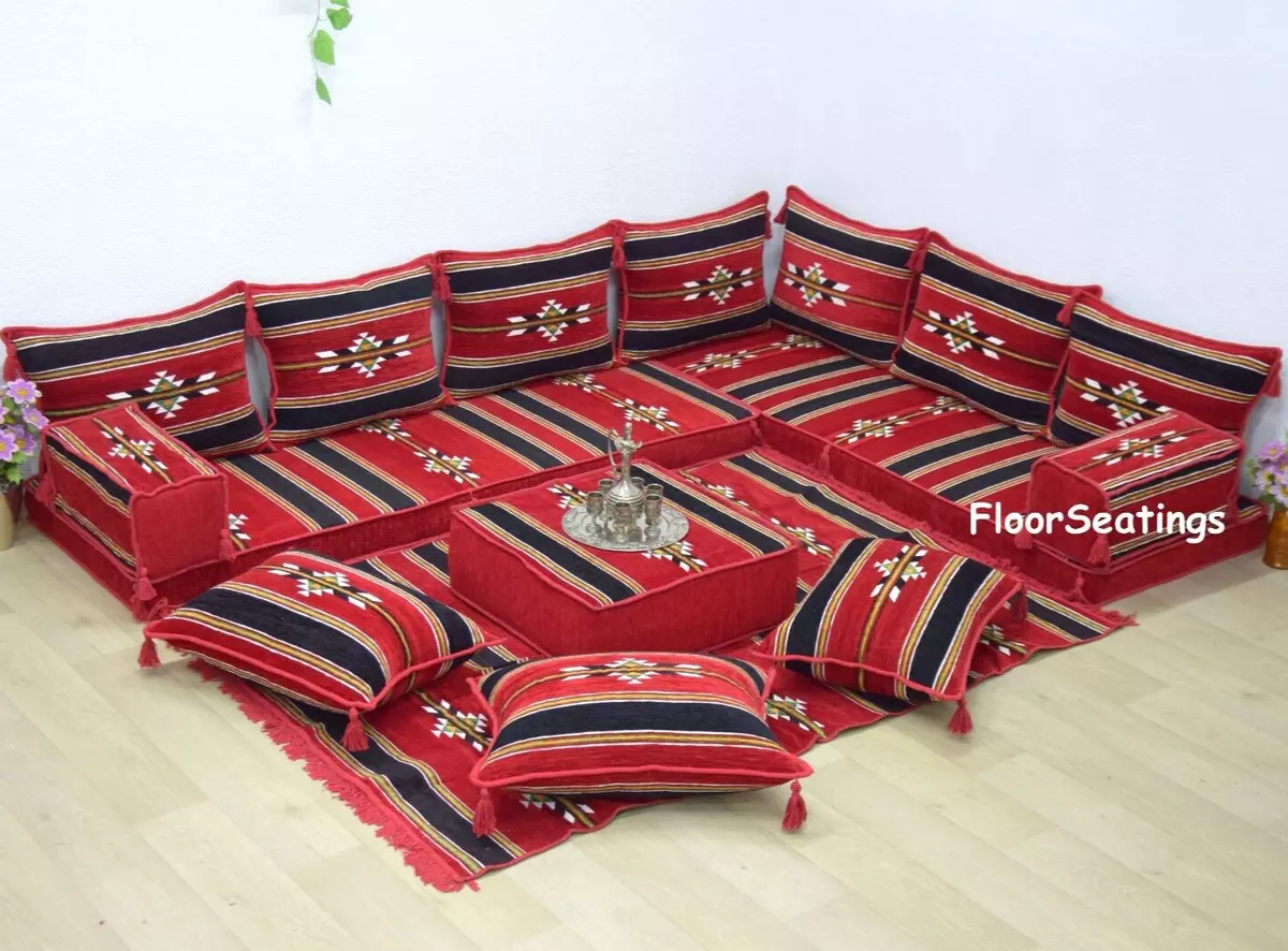Black sofa shop with red cushions