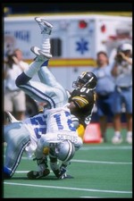 Defensive back Deion Sanders Dallas Cowboys falls on his head whil- Old Photo